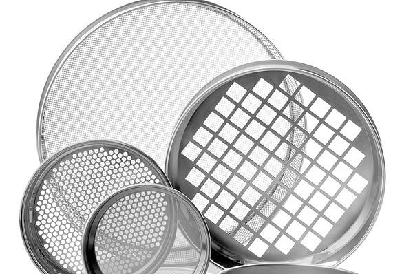 Stack of Endecotts laboratory test sieves
